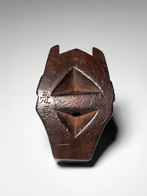 An ichii ittobori yew wood model of a Noh mask