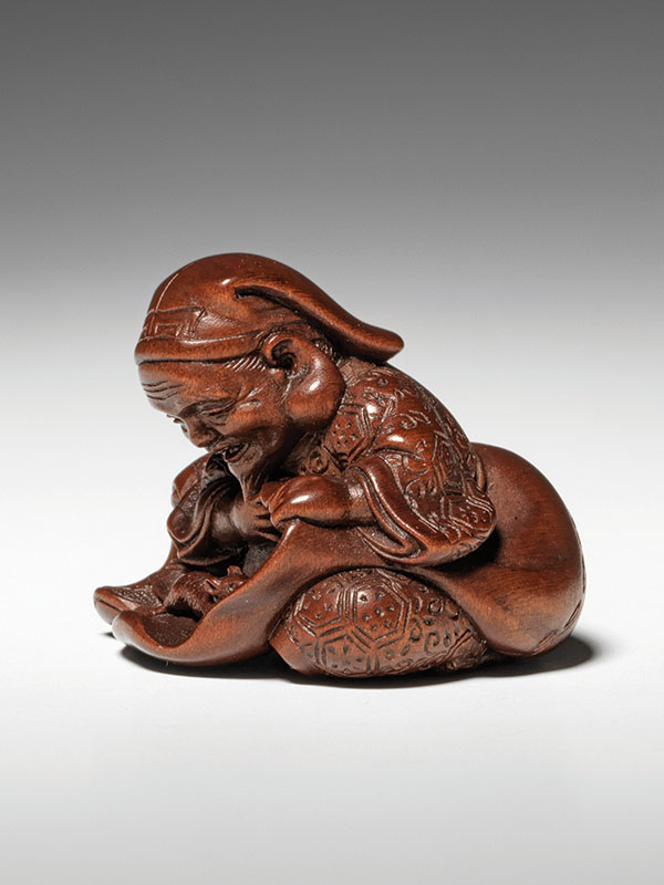 Daikoku, the God of Wealth laughs with delight